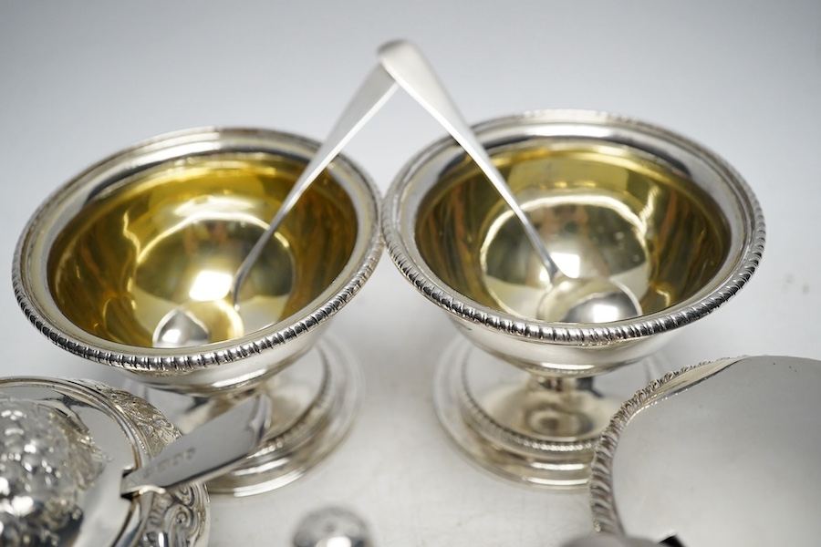 A pair of George III silver salts, London 1799, 240g, a George IV silver mustard pot, London 1822, 116g, a Victorian silver drum mustard pot, by Edward John and William Barnard, London 1850, four various mustard ladles (